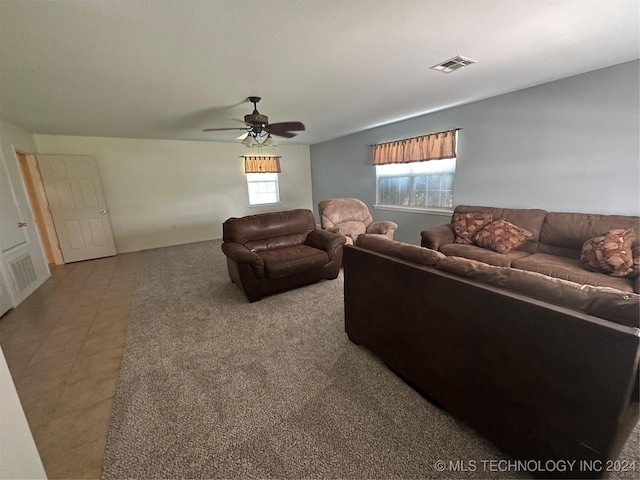 living room with carpet and ceiling fan