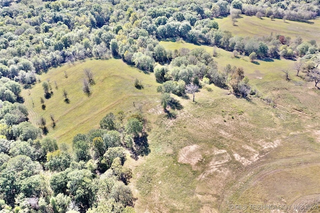 birds eye view of property featuring a rural view