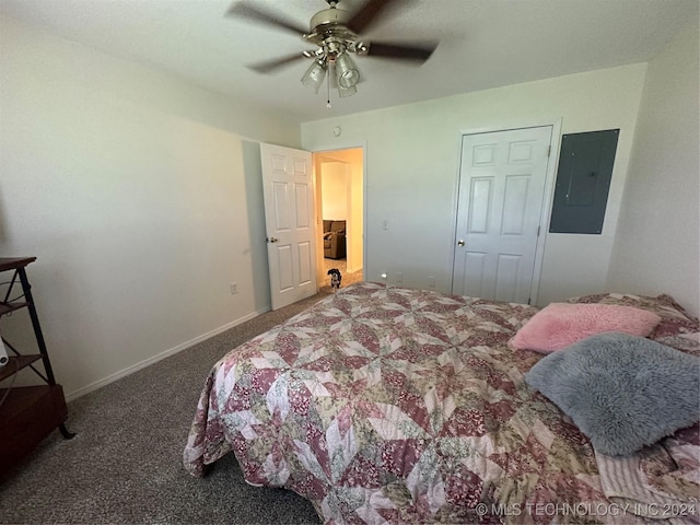 carpeted bedroom with ceiling fan and electric panel