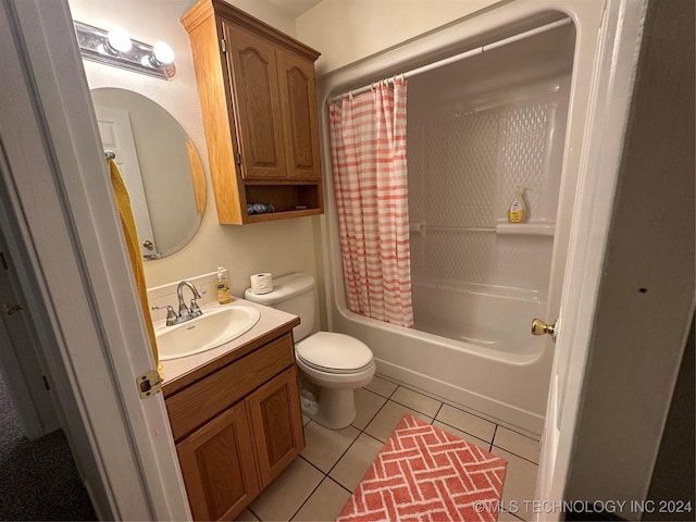 full bathroom featuring tile patterned floors, vanity, toilet, and shower / tub combo