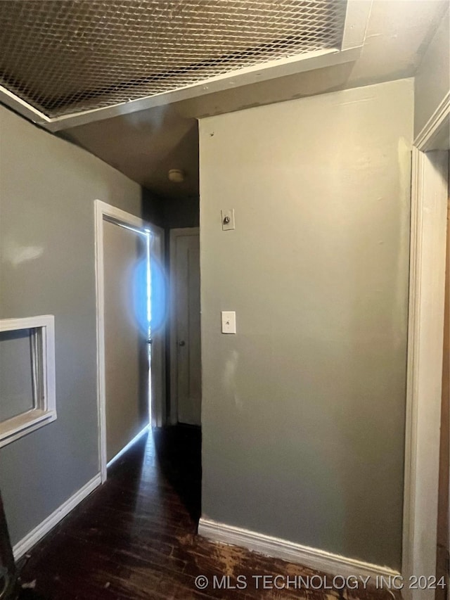 hall featuring dark hardwood / wood-style floors