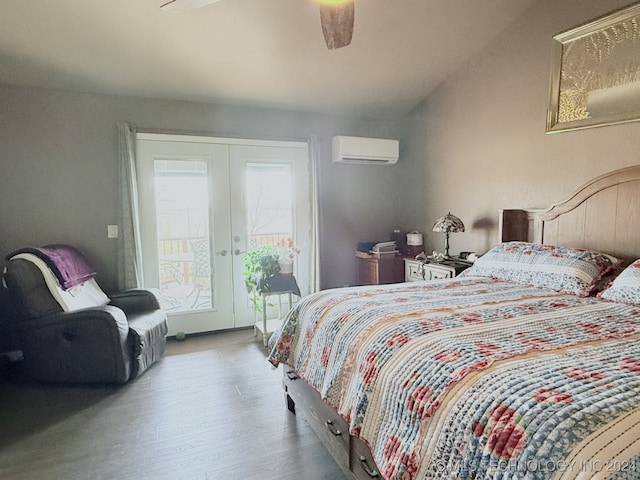 bedroom featuring ceiling fan, french doors, a wall unit AC, wood-type flooring, and access to outside