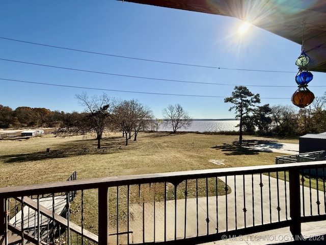 view of yard with a balcony