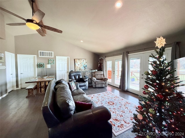 living room with french doors, dark hardwood / wood-style floors, ceiling fan, and lofted ceiling