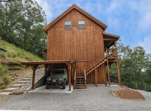 exterior space featuring a carport