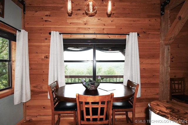 dining room with hardwood / wood-style floors