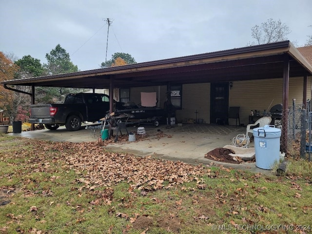 view of car parking featuring a carport