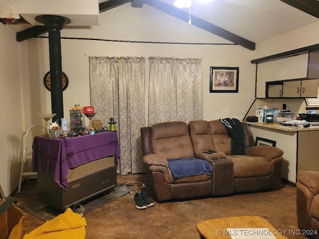 carpeted living room featuring vaulted ceiling with beams