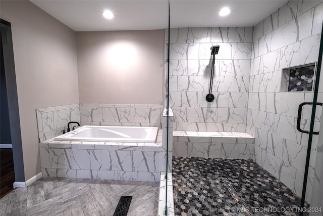 bathroom with independent shower and bath