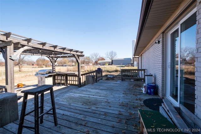 wooden terrace with a pergola