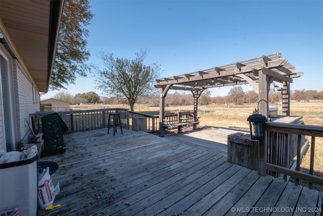 wooden deck featuring a pergola