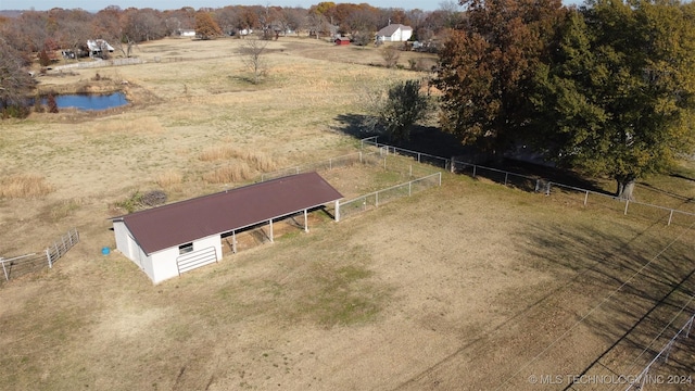 aerial view featuring a rural view and a water view