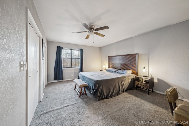 carpeted bedroom with ceiling fan