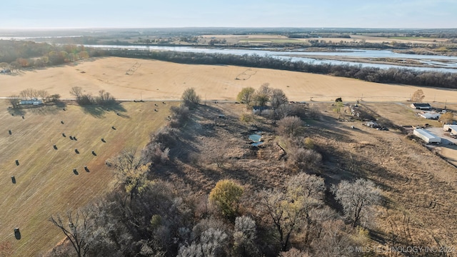 aerial view with a rural view and a water view