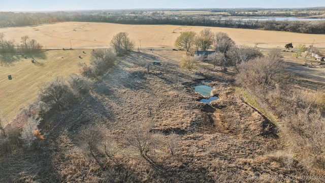 bird's eye view featuring a rural view and a water view