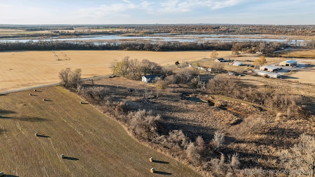 drone / aerial view with a rural view and a water view