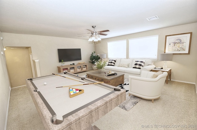 carpeted living room featuring ceiling fan and billiards