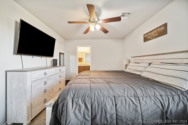 carpeted bedroom featuring ceiling fan and connected bathroom