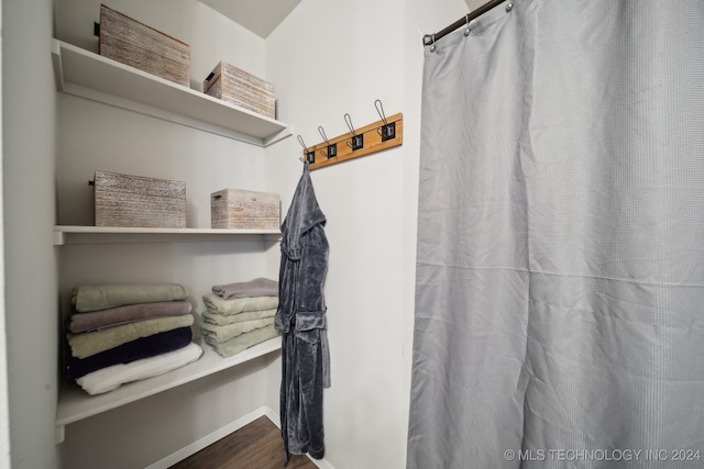 bathroom featuring wood-type flooring