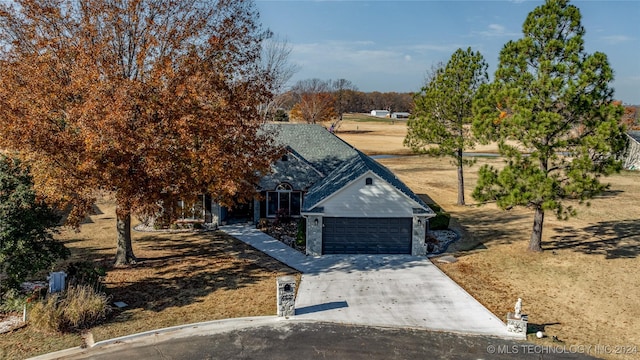 view of front of house with a garage and driveway