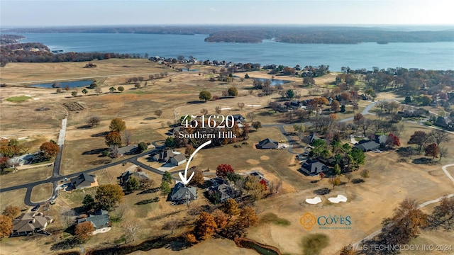 aerial view with a rural view and a water view