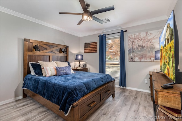 bedroom with ceiling fan, light hardwood / wood-style floors, and ornamental molding