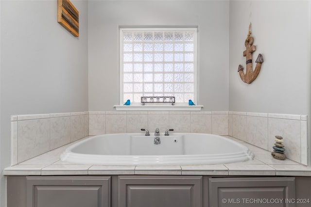 bathroom featuring a tub