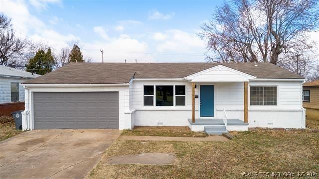 ranch-style house with a garage