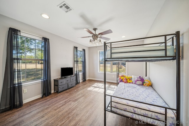 bedroom featuring hardwood / wood-style floors and ceiling fan