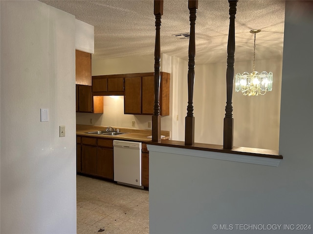 kitchen with dishwasher, sink, hanging light fixtures, a textured ceiling, and a chandelier