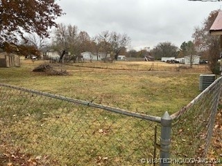 view of yard featuring central AC unit