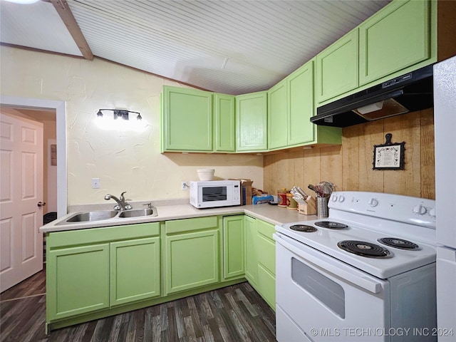 kitchen with white appliances, wooden walls, sink, dark hardwood / wood-style floors, and lofted ceiling