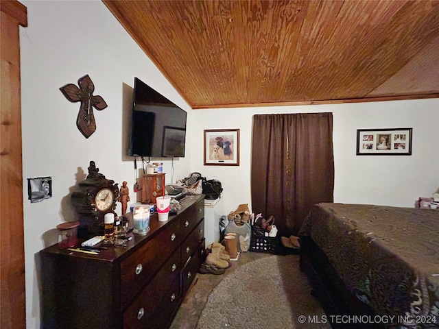 carpeted bedroom with lofted ceiling, crown molding, and wooden ceiling