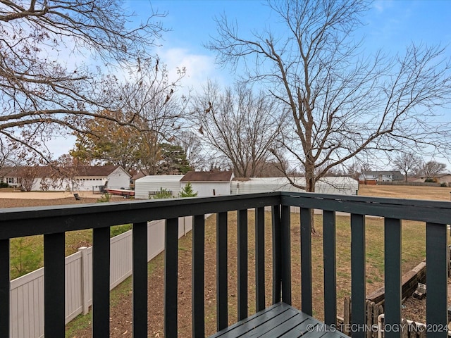 deck featuring a yard