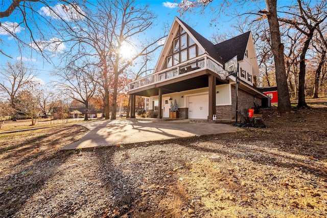 view of side of home with a garage