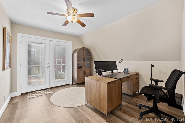 office space featuring ceiling fan, french doors, wood-type flooring, and lofted ceiling