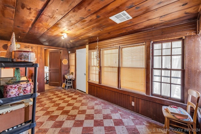 interior space featuring a wealth of natural light and wood ceiling