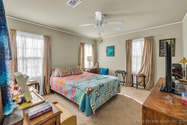 bedroom featuring ceiling fan and carpet floors