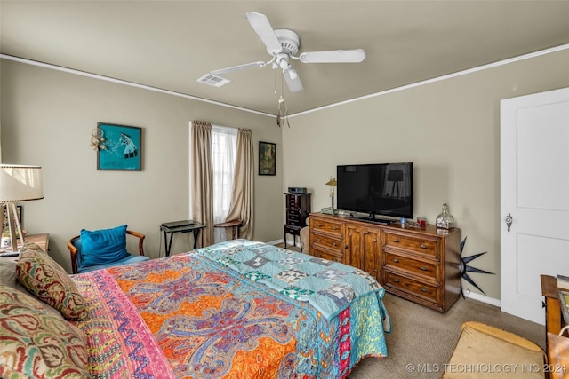 bedroom featuring light carpet and ceiling fan