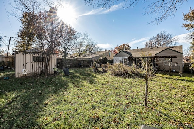 view of yard with a storage shed