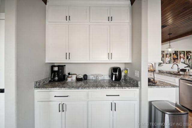 bar with sink, wooden ceiling, stainless steel dishwasher, lofted ceiling, and white cabinets