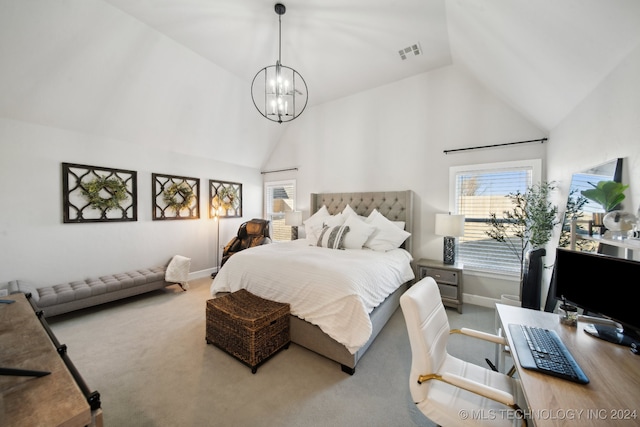 carpeted bedroom featuring vaulted ceiling and an inviting chandelier