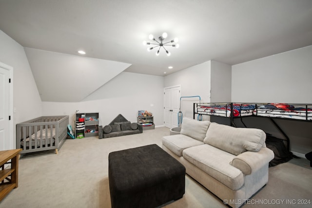 carpeted living room featuring lofted ceiling and an inviting chandelier