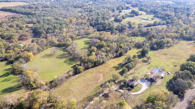 birds eye view of property featuring a rural view