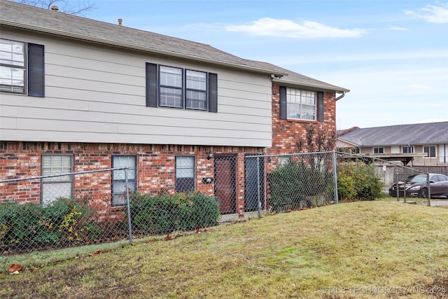 view of front of property with a front lawn