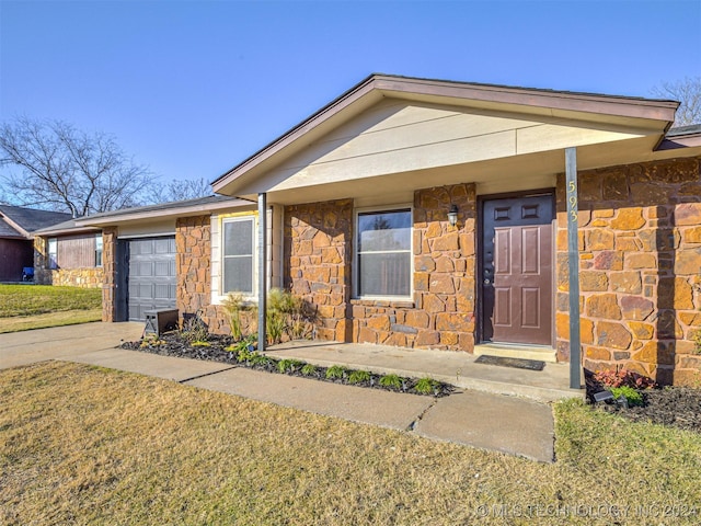 ranch-style house with a garage