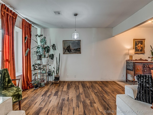 living area featuring hardwood / wood-style floors