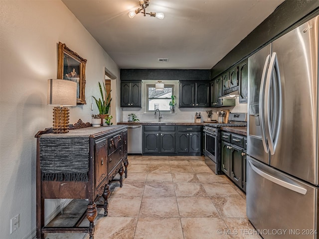 kitchen featuring sink and stainless steel appliances