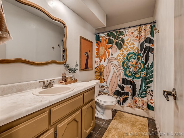 bathroom featuring tile patterned floors, vanity, toilet, and a shower with shower curtain