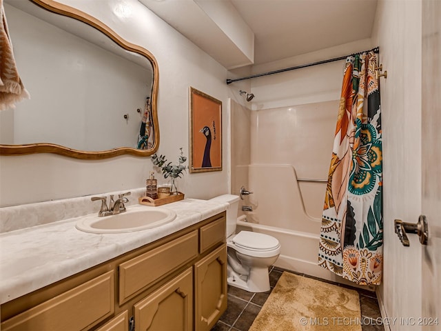 full bathroom with tile patterned flooring, vanity, toilet, and shower / bath combo with shower curtain